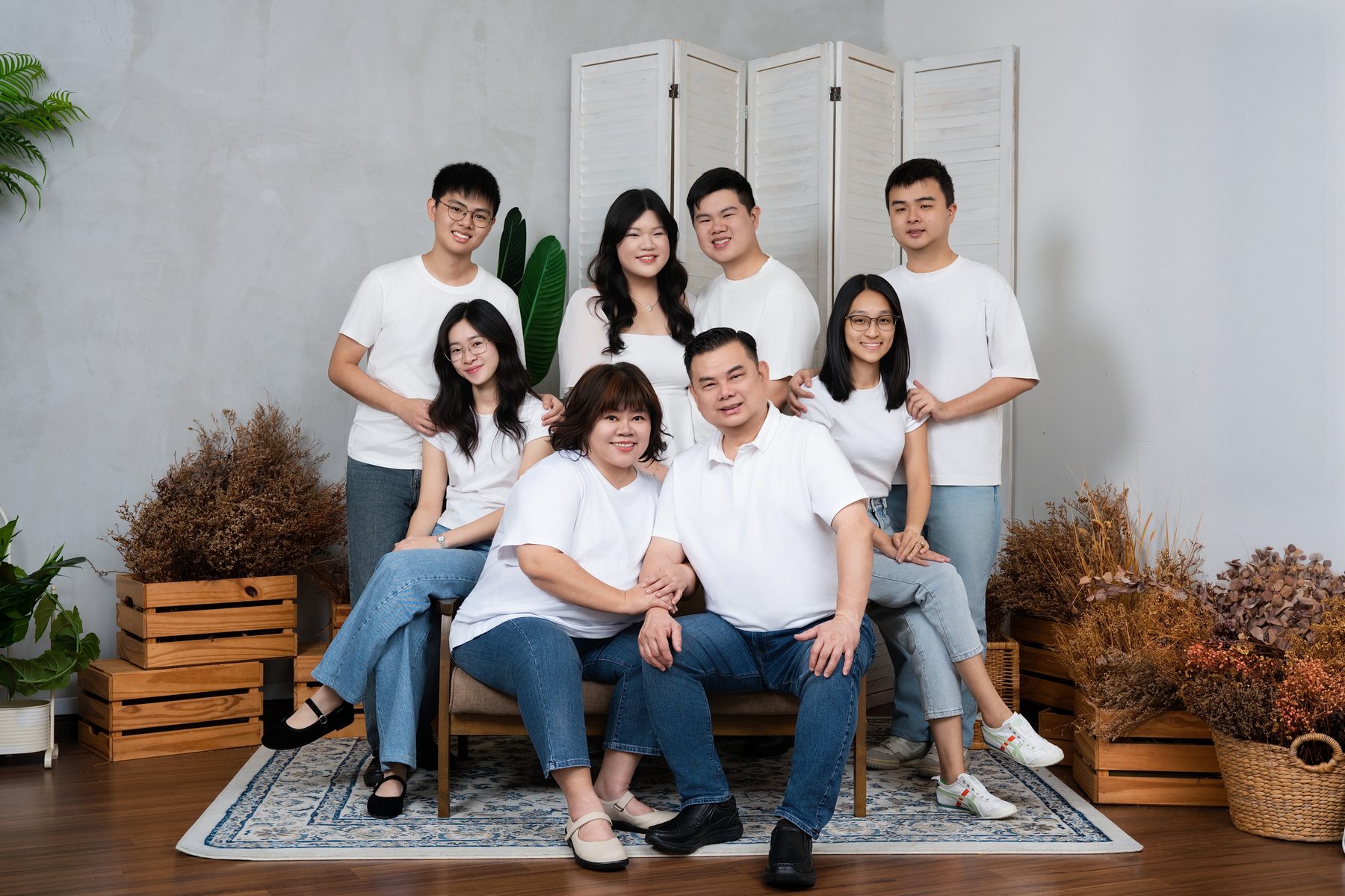 Premo Studio real client family portrait — four-person nuclear family, studio lighting