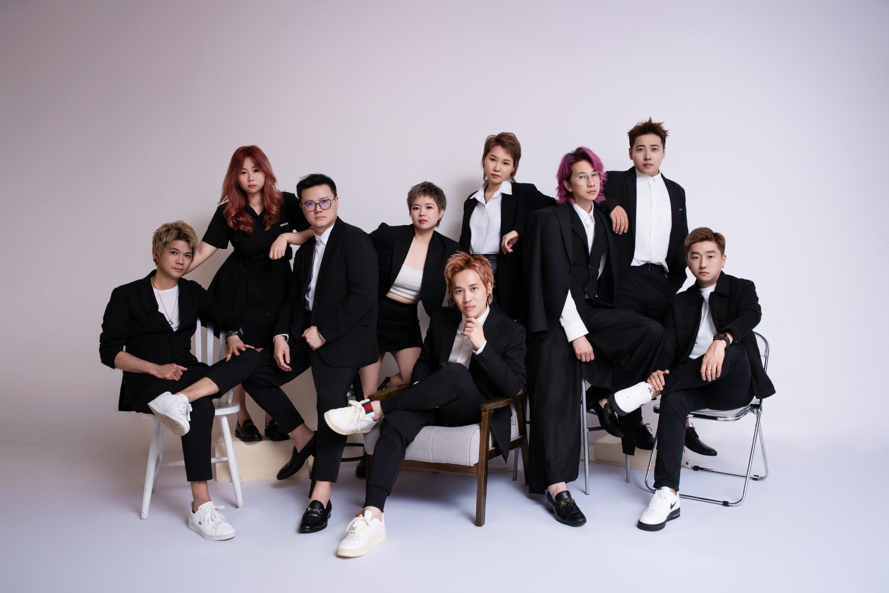 Premo Studio real client business portrait — 10-person company team group photo