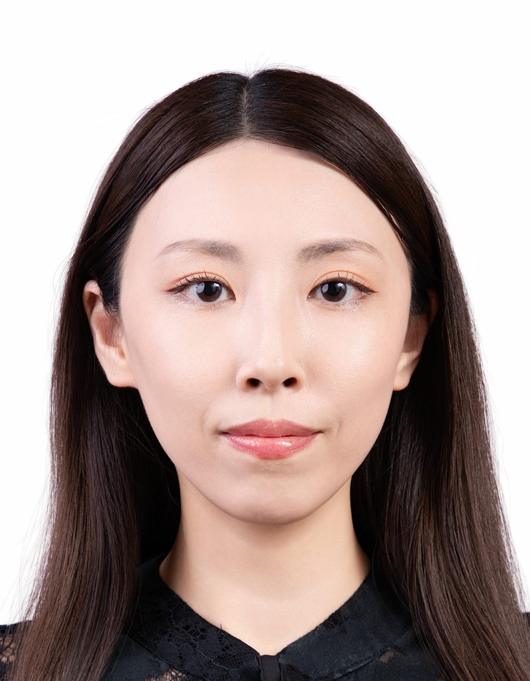 Premo Studio real client passport photo — baby, white background