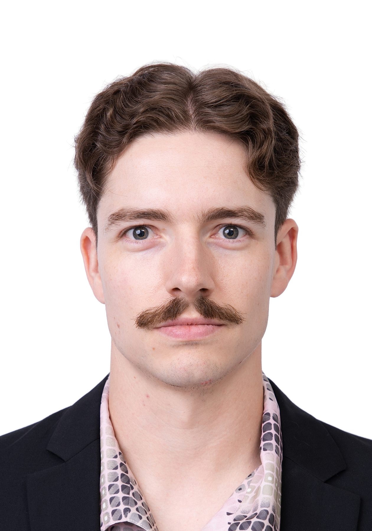Premo Studio real client passport photo — man with moustache, white background