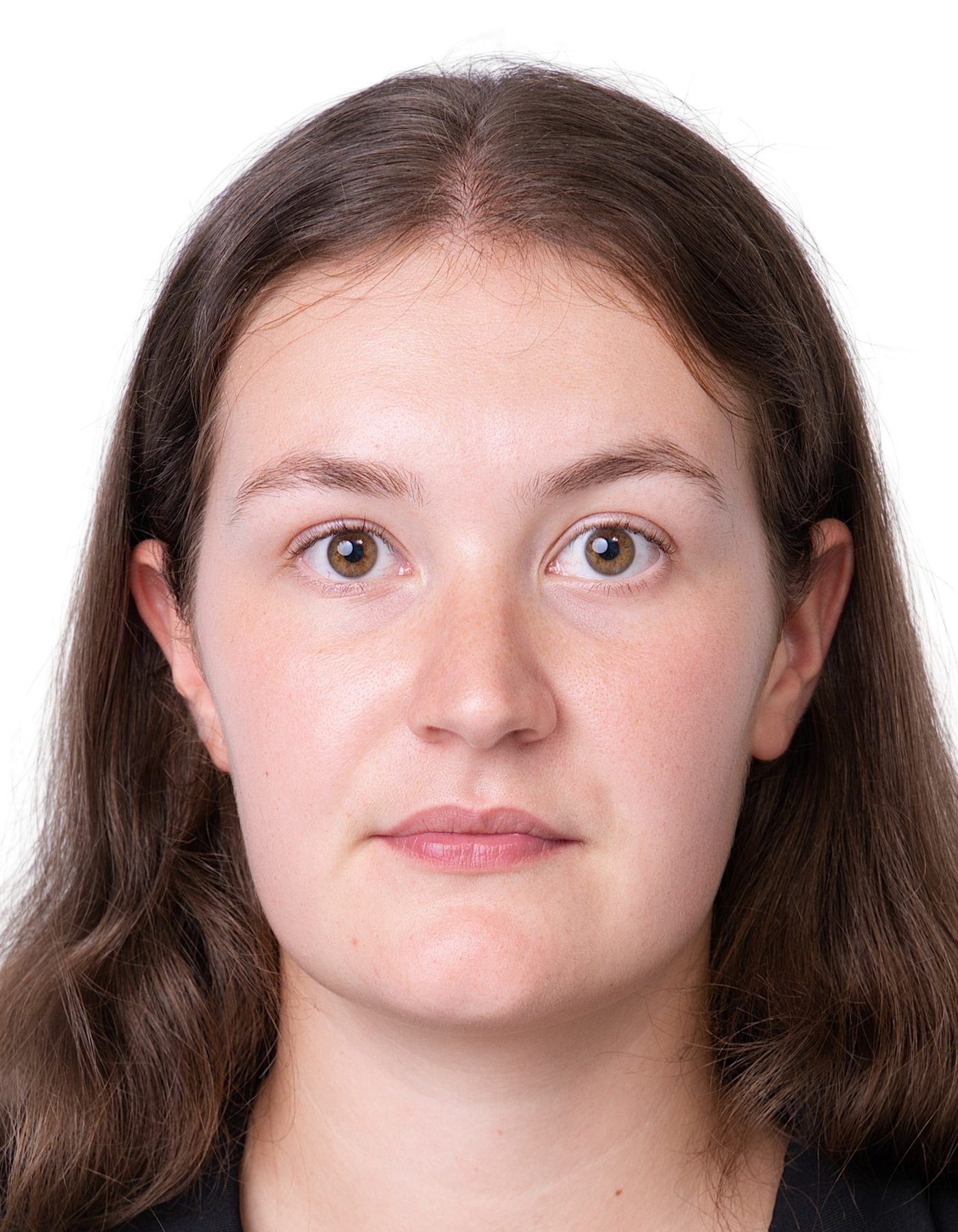 Premo Studio real client passport photo — woman, white background